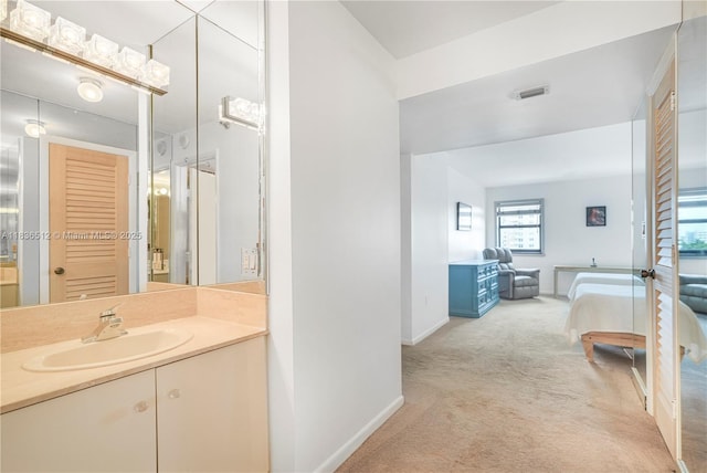 1201 S Ocean Dr Unit 410S, Hollywood, FL 33019 - bathroom featuring vanity and baseboards