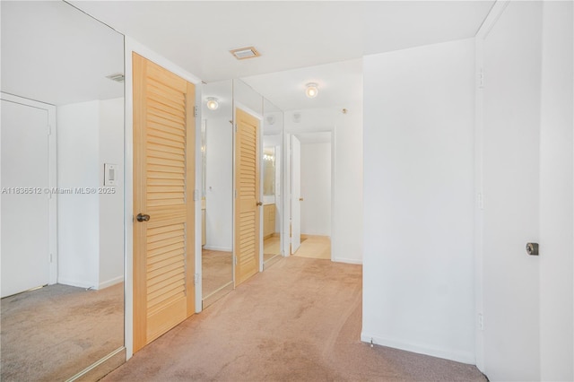1201 S Ocean Dr Unit 410S, Hollywood, FL 33019 - corridor with carpet flooring and baseboards