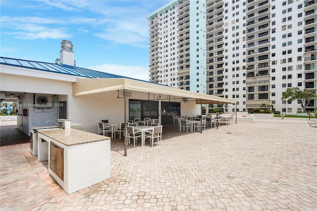 1201 S Ocean Dr Unit 410S, Hollywood, FL 33019 - view of patio / terrace with outdoor dining space