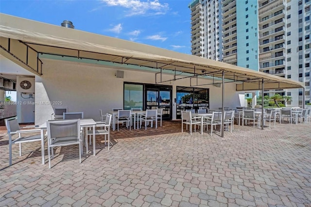1201 S Ocean Dr Unit 410S, Hollywood, FL 33019 - view of patio featuring outdoor dining area