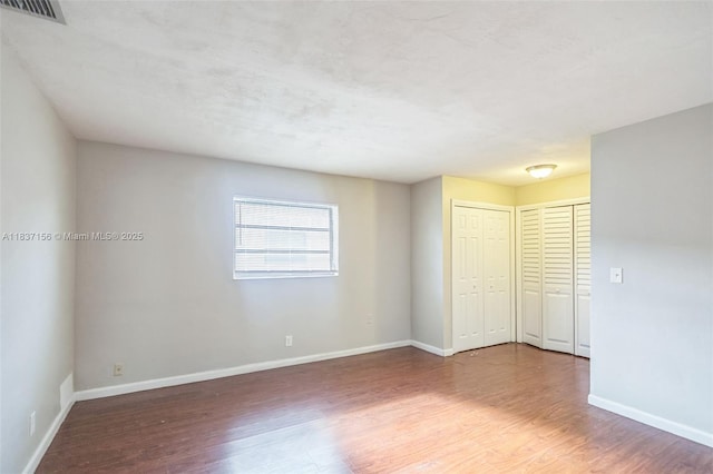 5640 NW 13th Ct, Lauderhill, FL 33313 - spare room featuring wood finished floors