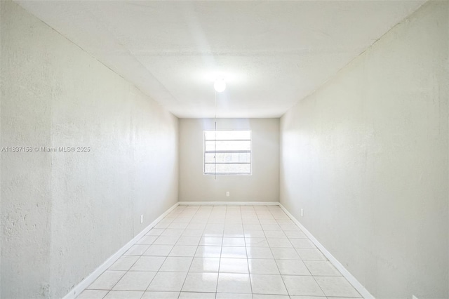 5640 NW 13th Ct, Lauderhill, FL 33313 - spare room with baseboards and light tile patterned flooring