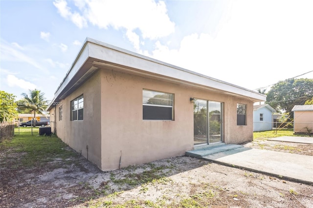 5640 NW 13th Ct, Lauderhill, FL 33313 - back of property featuring stucco siding