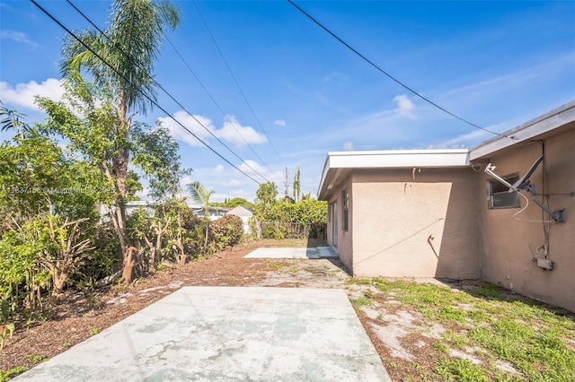 5640 NW 13th Ct, Lauderhill, FL 33313 - fenced backyard featuring a patio