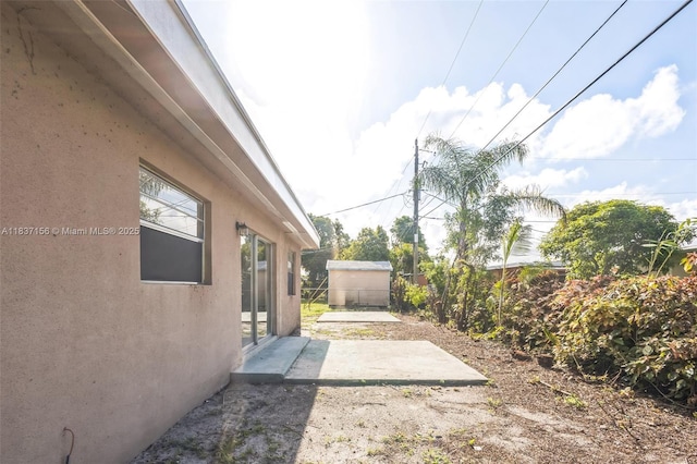 5640 NW 13th Ct, Lauderhill, FL 33313 - view of yard featuring a patio area
