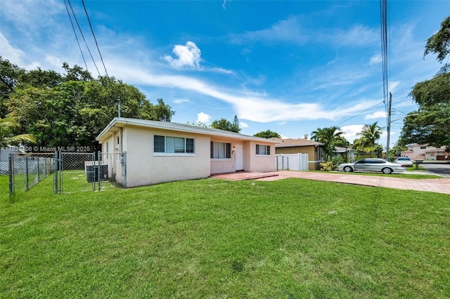 312 SW 2nd Ter, Hallandale Beach, FL 33009 - ranch-style home featuring stucco siding, a gate, and driveway