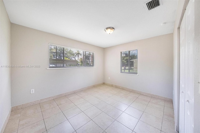312 SW 2nd Ter, Hallandale Beach, FL 33009 - unfurnished room featuring light tile patterned flooring and baseboards