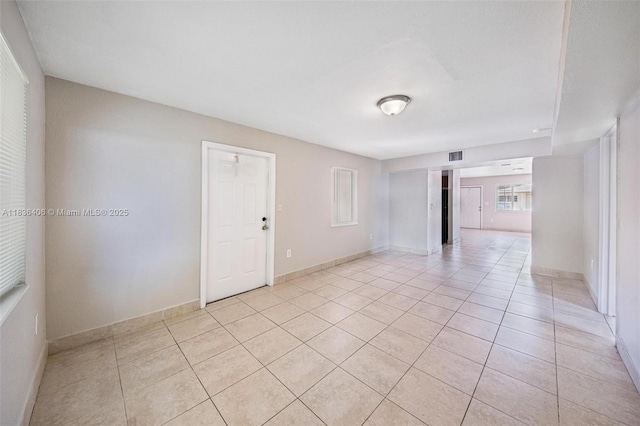 312 SW 2nd Ter, Hallandale Beach, FL 33009 - unfurnished room with light tile patterned flooring