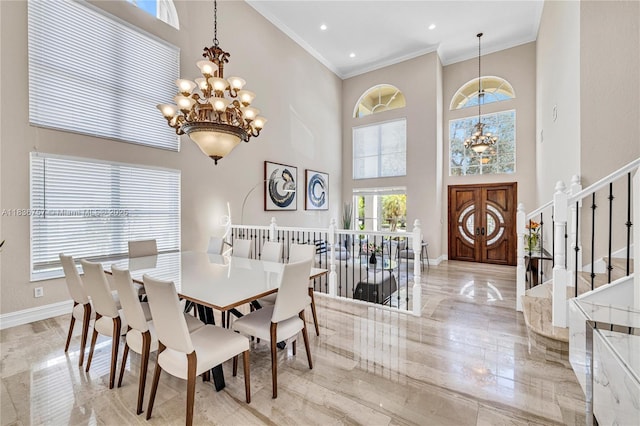 19480 SW 39th Ct, Miramar, FL 33029 - dining space featuring a chandelier, a high ceiling, ornamental molding, stairs, and recessed lighting