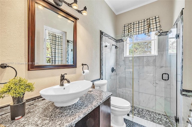 19480 SW 39th Ct, Miramar, FL 33029 - bathroom with a textured wall, a shower stall, vanity, and ornamental molding