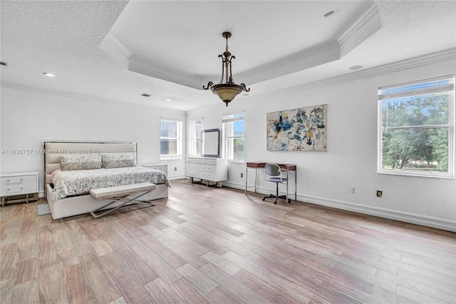 19480 SW 39th Ct, Miramar, FL 33029 - bedroom featuring ornamental molding, a raised ceiling, wood finished floors, and a textured ceiling