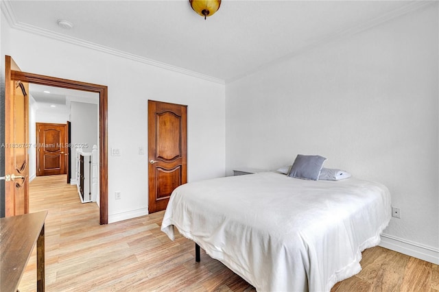 19480 SW 39th Ct, Miramar, FL 33029 - bedroom with light wood-style flooring and ornamental molding