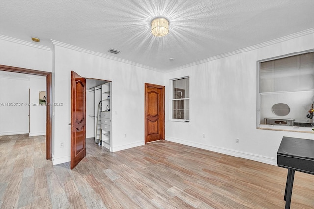 19480 SW 39th Ct, Miramar, FL 33029 - unfurnished bedroom with wood finished floors, crown molding, and a textured ceiling