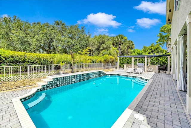19480 SW 39th Ct, Miramar, FL 33029 - view of swimming pool with a fenced backyard, a patio, and view of wooded area