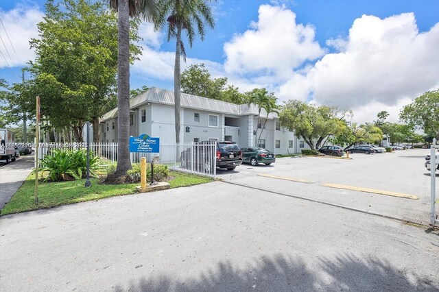 17255 SW 95th Ave Unit 202, Palmetto Bay, FL 33157 - view of asphalt road with a residential view