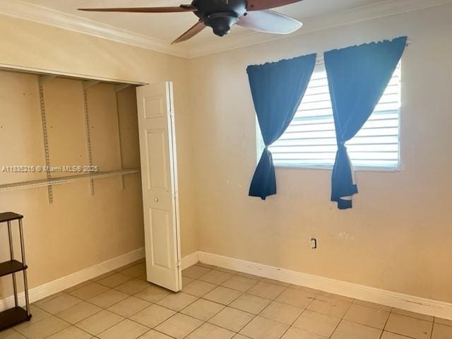 17255 SW 95th Ave Unit 202, Palmetto Bay, FL 33157 - unfurnished bedroom featuring crown molding, light tile patterned floors, and ceiling fan