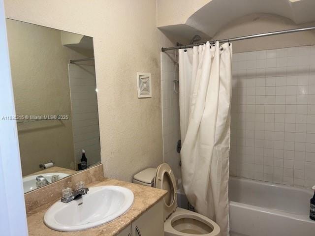 17255 SW 95th Ave Unit 202, Palmetto Bay, FL 33157 - full bath with a textured wall, vanity, and shower / bath combination with curtain