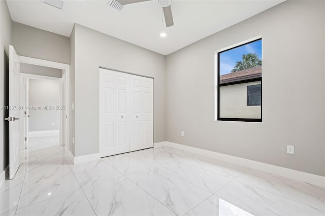 1244 NW 30th Ave, Fort Lauderdale, FL 33311 - unfurnished bedroom with light marble finish floors, a closet, ceiling fan, and recessed lighting