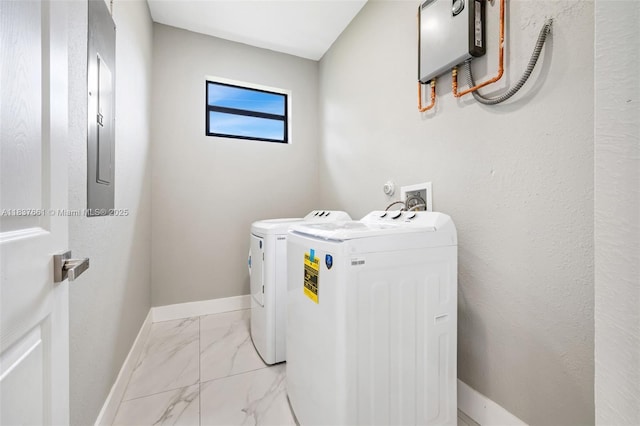 1244 NW 30th Ave, Fort Lauderdale, FL 33311 - washroom featuring washer and clothes dryer and light marble finish floors