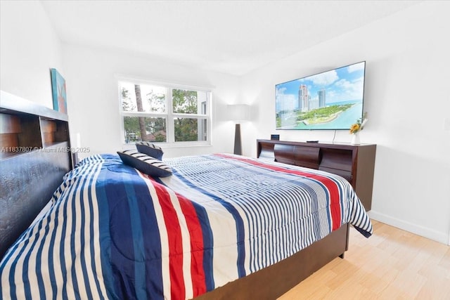 1501 S Ocean Blvd Unit 227, Lauderdale By The Sea, FL 33062 - bedroom with wood finished floors and baseboards