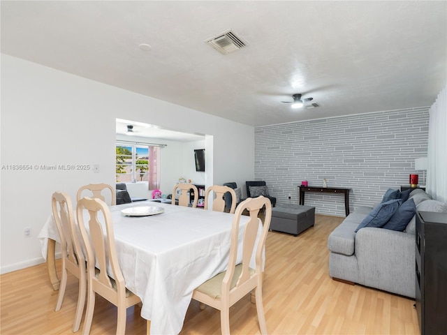 6530 Tyler St, Hollywood, FL 33024 - dining area featuring light wood-style flooring