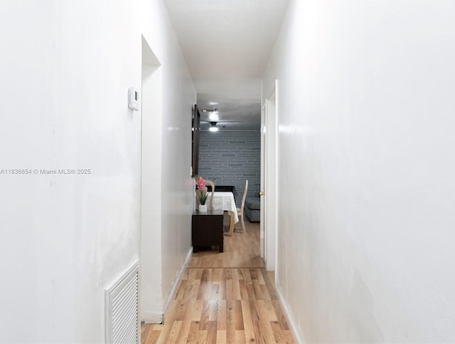 6530 Tyler St, Hollywood, FL 33024 - corridor featuring light wood-style flooring