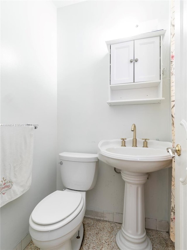 6530 Tyler St, Hollywood, FL 33024 - half bath with speckled floor and toilet
