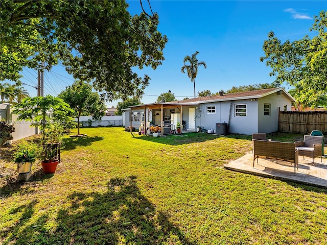 6530 Tyler St, Hollywood, FL 33024 - fenced backyard featuring a patio area