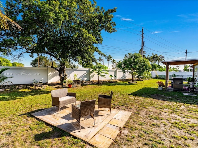 6530 Tyler St, Hollywood, FL 33024 - fenced backyard featuring a patio area
