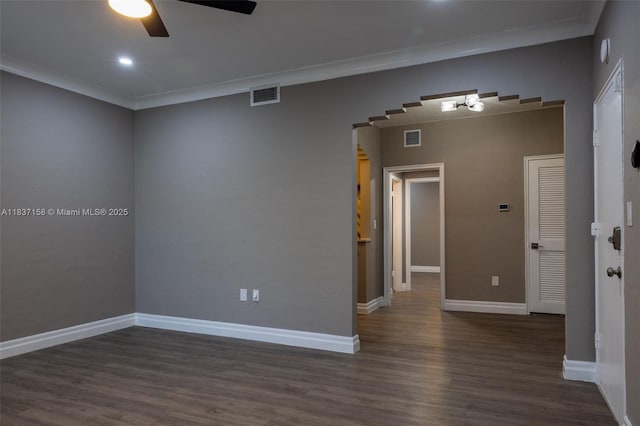1611 Euclid Ave Unit 5, Miami Beach, FL 33139 - empty room with ceiling fan, wood finished floors, ornamental molding, and arched walkways