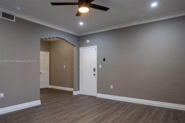 1611 Euclid Ave Unit 5, Miami Beach, FL 33139 - spare room featuring ceiling fan, wood finished floors, arched walkways, ornamental molding, and recessed lighting