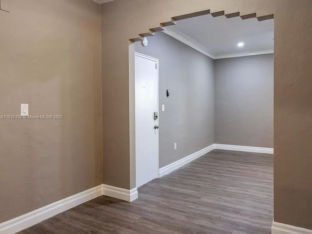 1611 Euclid Ave Unit 5, Miami Beach, FL 33139 - spare room featuring wood finished floors, crown molding, and recessed lighting