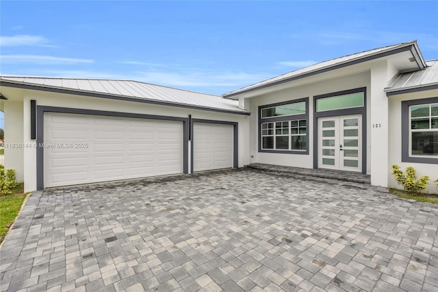121 SW Sea Lion Rd, Port St Lucie, FL 34953 - garage with driveway
