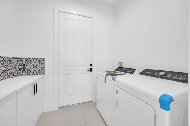 121 SW Sea Lion Rd, Port St Lucie, FL 34953 - laundry area featuring independent washer and dryer and light tile patterned floors