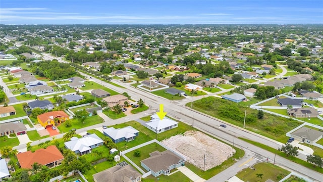 121 SW Sea Lion Rd, Port St Lucie, FL 34953 - aerial perspective of suburban area