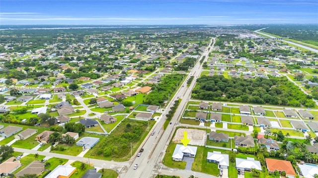 121 SW Sea Lion Rd, Port St Lucie, FL 34953 - aerial overview of property's location with nearby suburban area