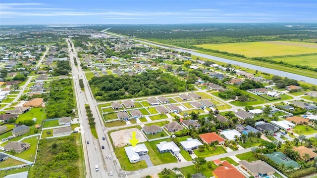 121 SW Sea Lion Rd, Port St Lucie, FL 34953 - view of property location featuring a nearby body of water and nearby suburban area