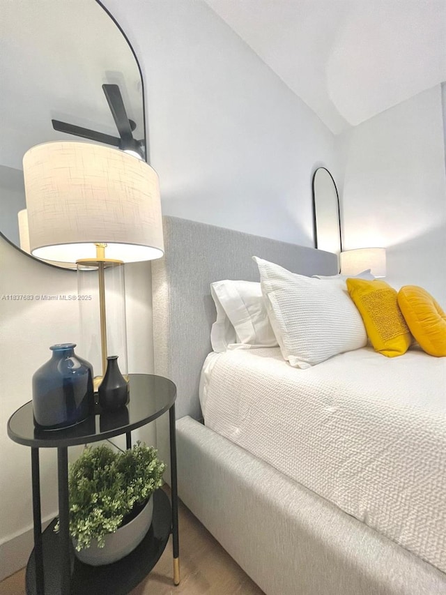 936 Pennsylvania Ave Unit 101, Miami Beach, FL 33139 - bedroom with wood finished floors and vaulted ceiling