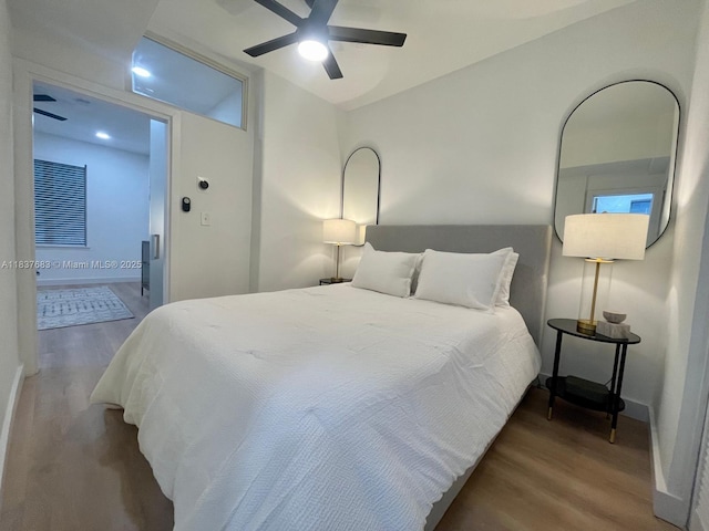 936 Pennsylvania Ave Unit 101, Miami Beach, FL 33139 - bedroom with wood finished floors, ceiling fan, and connected bathroom