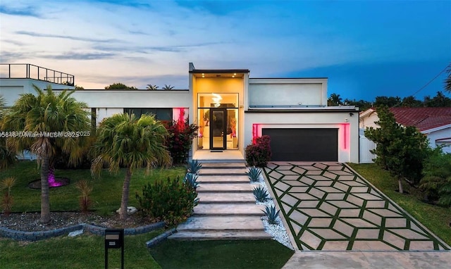 2225 NE 19th St, Fort Lauderdale, FL 33305 - view of front of home with driveway and stucco siding
