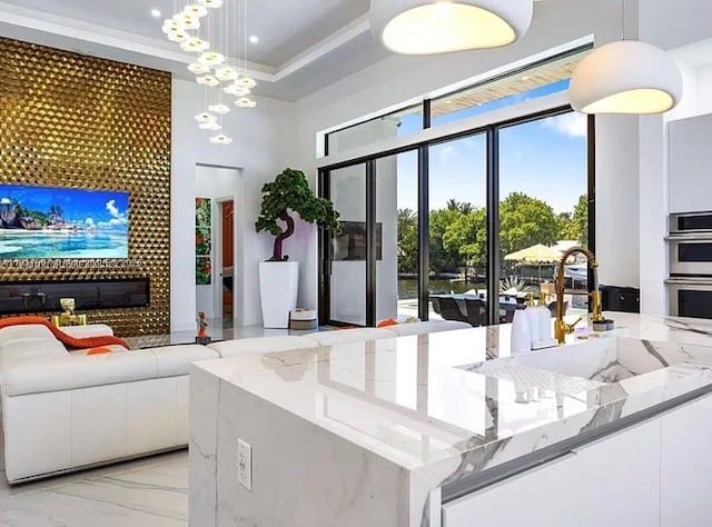2225 NE 19th St, Fort Lauderdale, FL 33305 - community lobby featuring a high ceiling and a sink