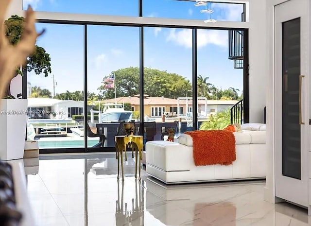 2225 NE 19th St, Fort Lauderdale, FL 33305 - living room with marble tiled flooring