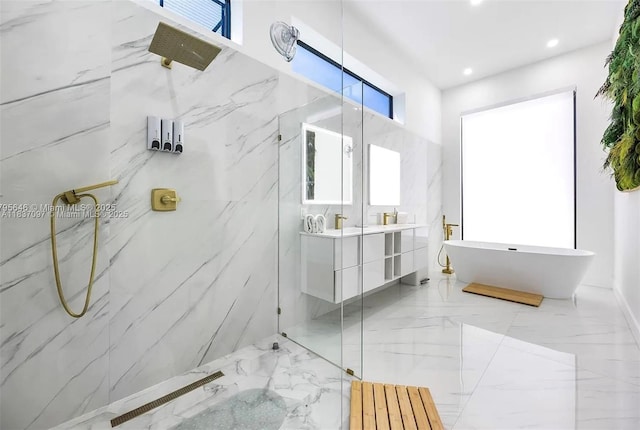 2225 NE 19th St, Fort Lauderdale, FL 33305 - bathroom featuring marble tiled flooring, a marble finish shower, a freestanding tub, double vanity, and recessed lighting