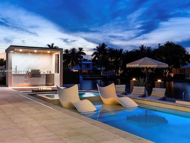 2225 NE 19th St, Fort Lauderdale, FL 33305 - view of pool with area for grilling, a pool with connected hot tub, and a patio