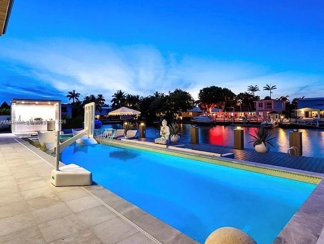 2225 NE 19th St, Fort Lauderdale, FL 33305 - outdoor pool featuring a patio, a water view, and a boat dock
