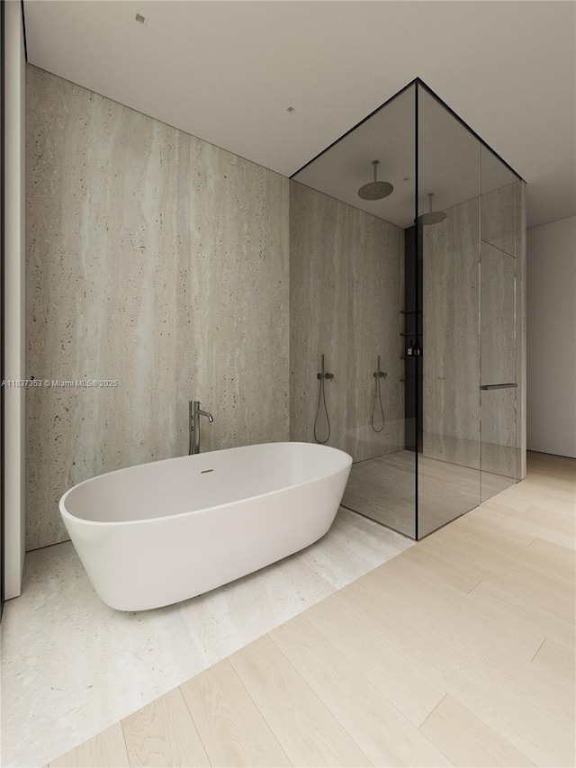 1661 Onaway Dr, Miami, FL 33133 - bathroom with walk in shower and a freestanding tub