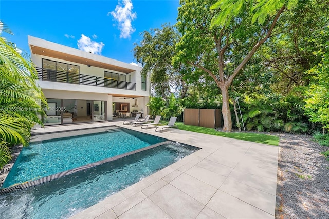 260 NW 47th St, Miami, FL 33127 - view of swimming pool with a patio area and a pool with connected hot tub