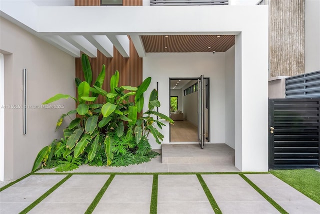 260 NW 47th St, Miami, FL 33127 - doorway to property featuring stucco siding