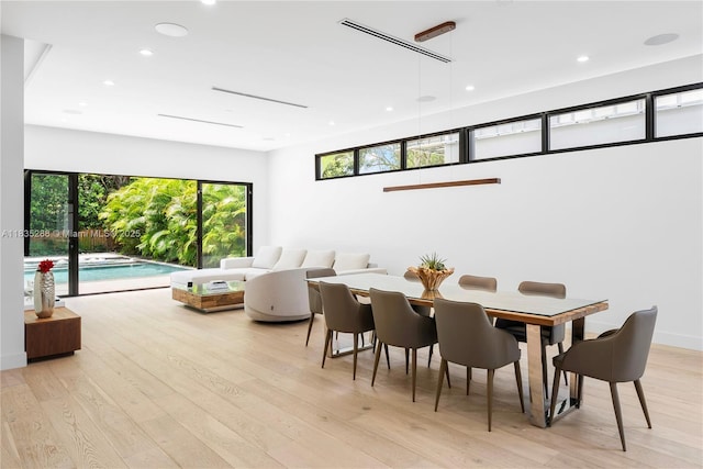 260 NW 47th St, Miami, FL 33127 - dining space with recessed lighting and light wood finished floors