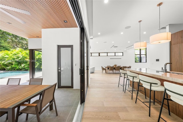 260 NW 47th St, Miami, FL 33127 - dining area featuring recessed lighting and light wood-style flooring